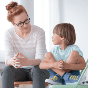 Woman and child sitting next to each other